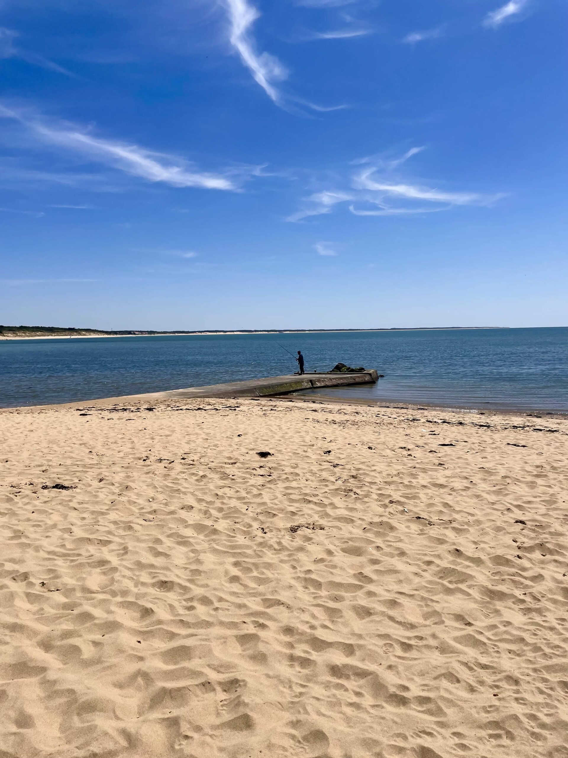 Pêcheur sur l'estacade, Plage du Goulet